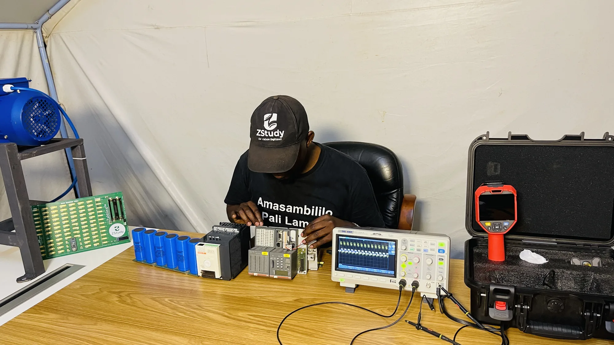 Hands-on electronics work at the HCS bench