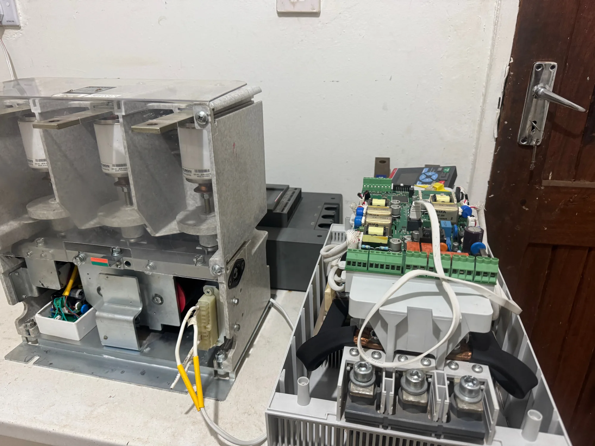 Contactor and ABB soft starter opened on the HCS bench