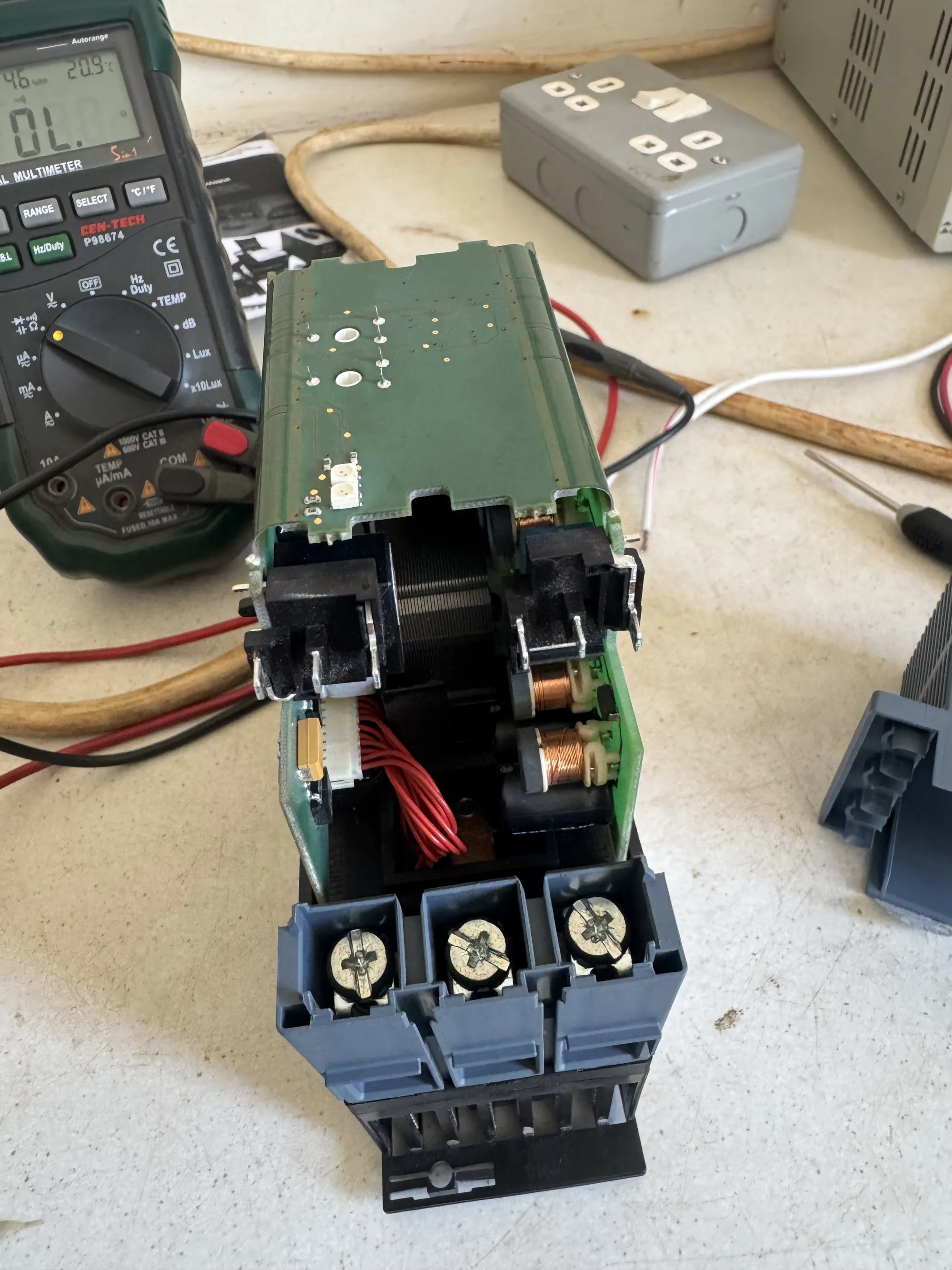 A Siemens soft starter opened on the HCS bench for diagnosis