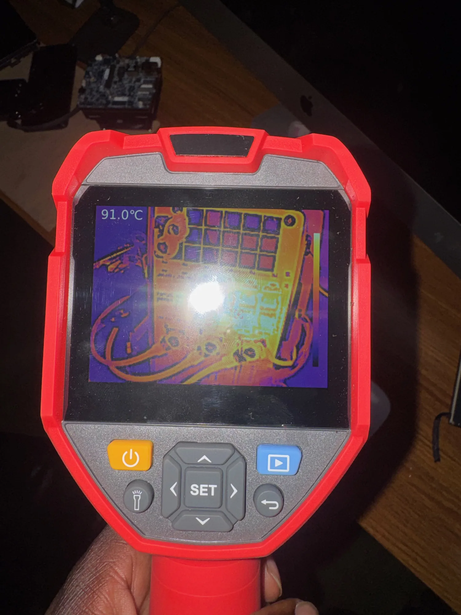 Thermal camera showing a 91 °C hotspot on a circuit board