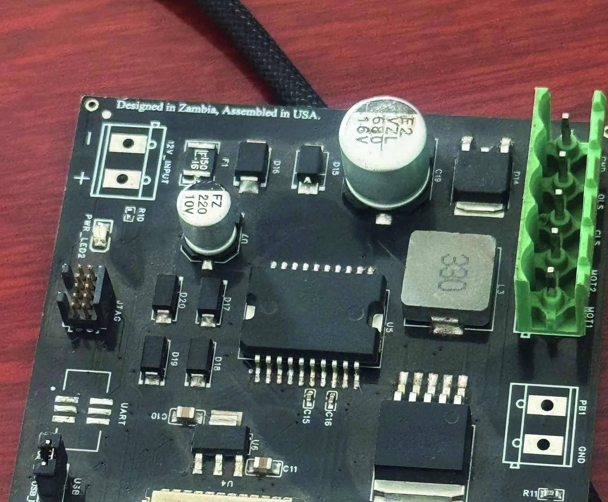 WaterHandler control board silkscreened 'Designed in Zambia, Assembled in USA'